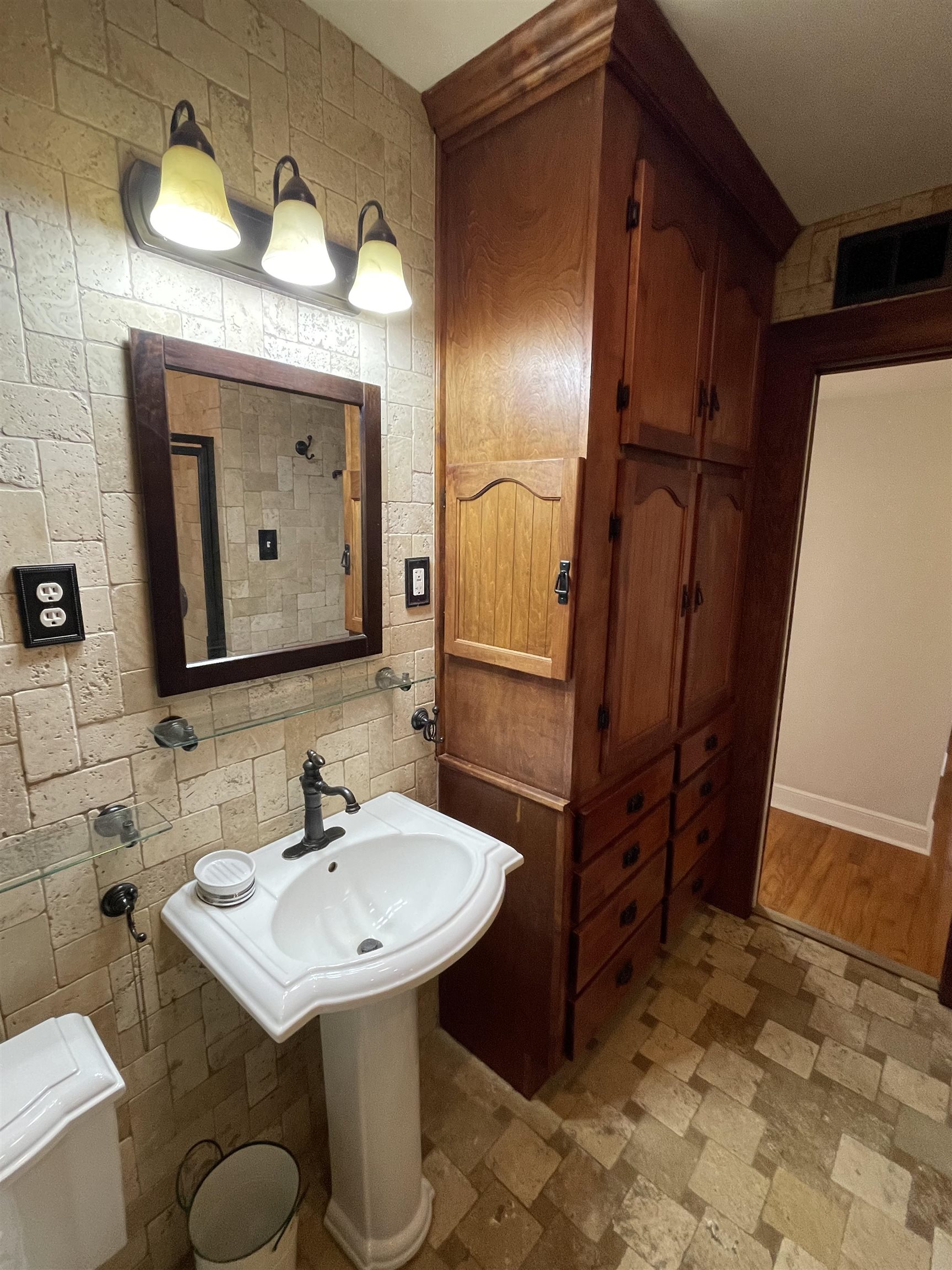 1020 Sandra Street Memphis, TN 38122 - Photo 22 of 40 a bathroom with a sink and a mirror