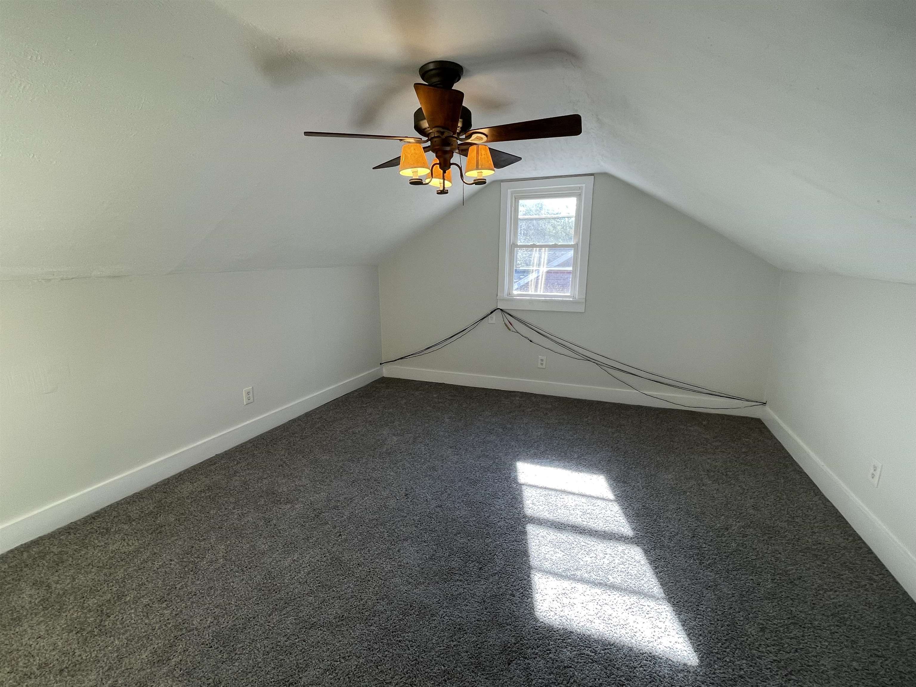 1020 Sandra Street Memphis, TN 38122 - Photo 23 of 40 an empty room with windows and fan