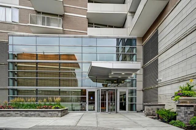 a front view of a building with a street