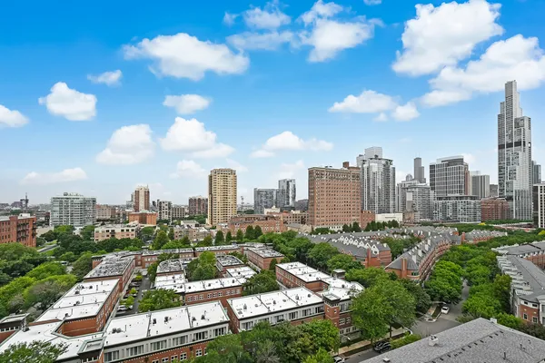 a view of a city with tall buildings