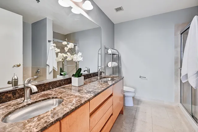 a bathroom with sink and mirror