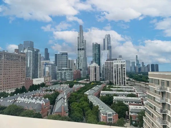 a view of a city with tall buildings