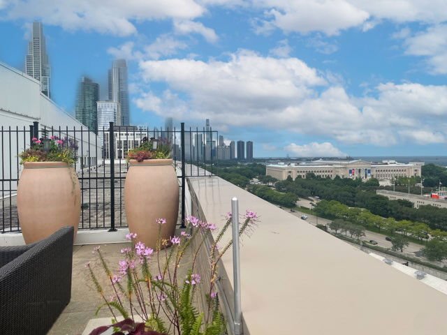 1515 South Prairie Avenue, Unit 1318 Chicago, IL 60605 - Photo 27 of 31 a view of a lake from a balcony