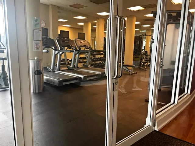 a view of a room with gym equipment