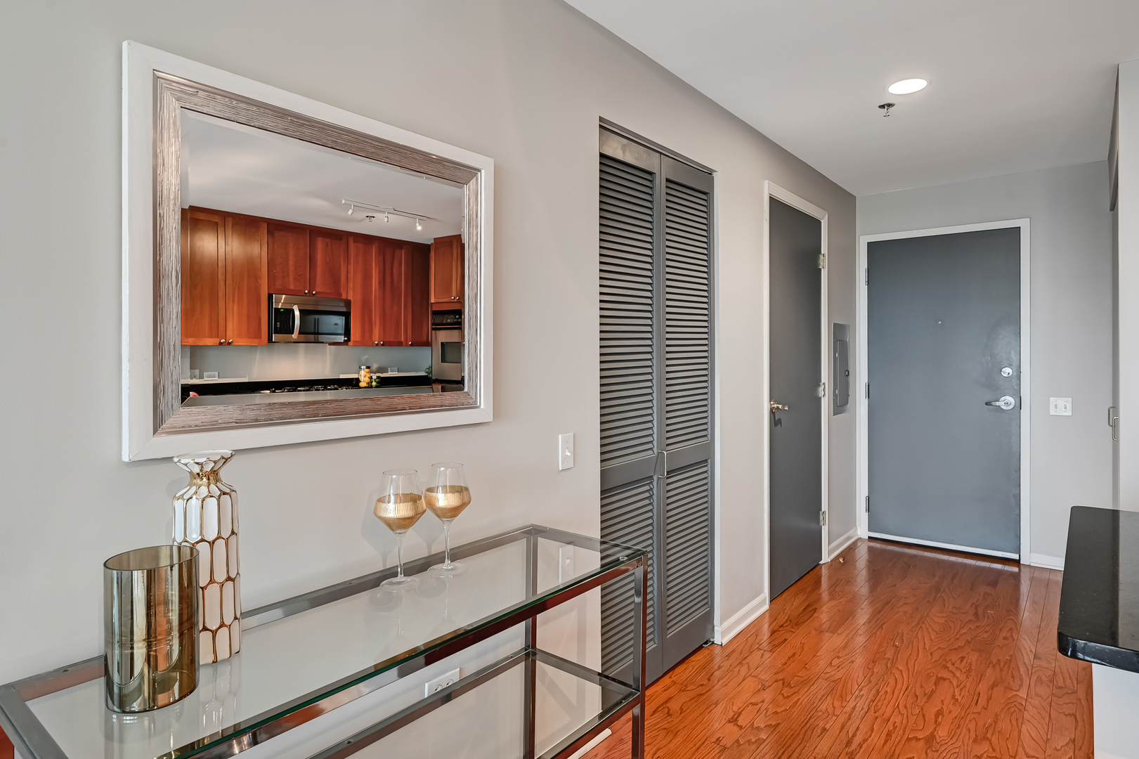 1515 South Prairie Avenue, Unit 1318 Chicago, IL 60605 - Photo 4 of 31 a bedroom with a bed and a flat screen tv