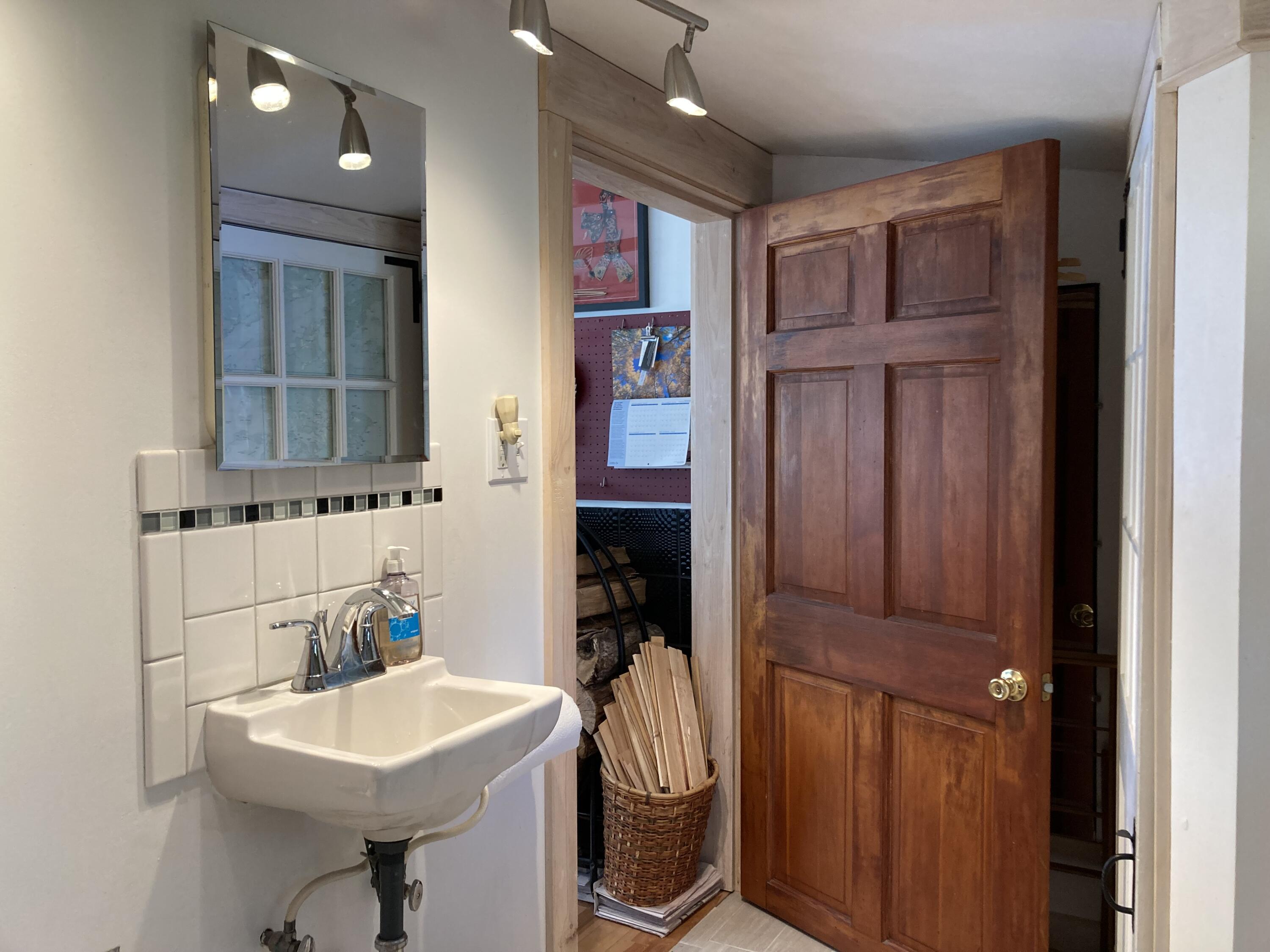 349 Oceanville Road Stonington, ME 04681 - Photo 13 of 16 Entry to full bath from kitchen.