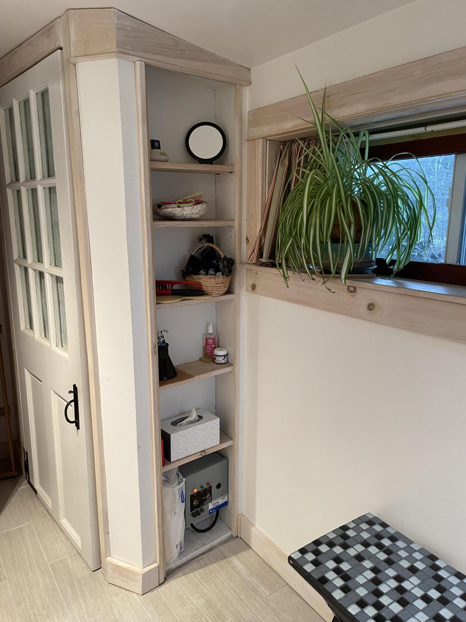 349 Oceanville Road Stonington, ME 04681 - Photo 14 of 16 Bathroom storage.