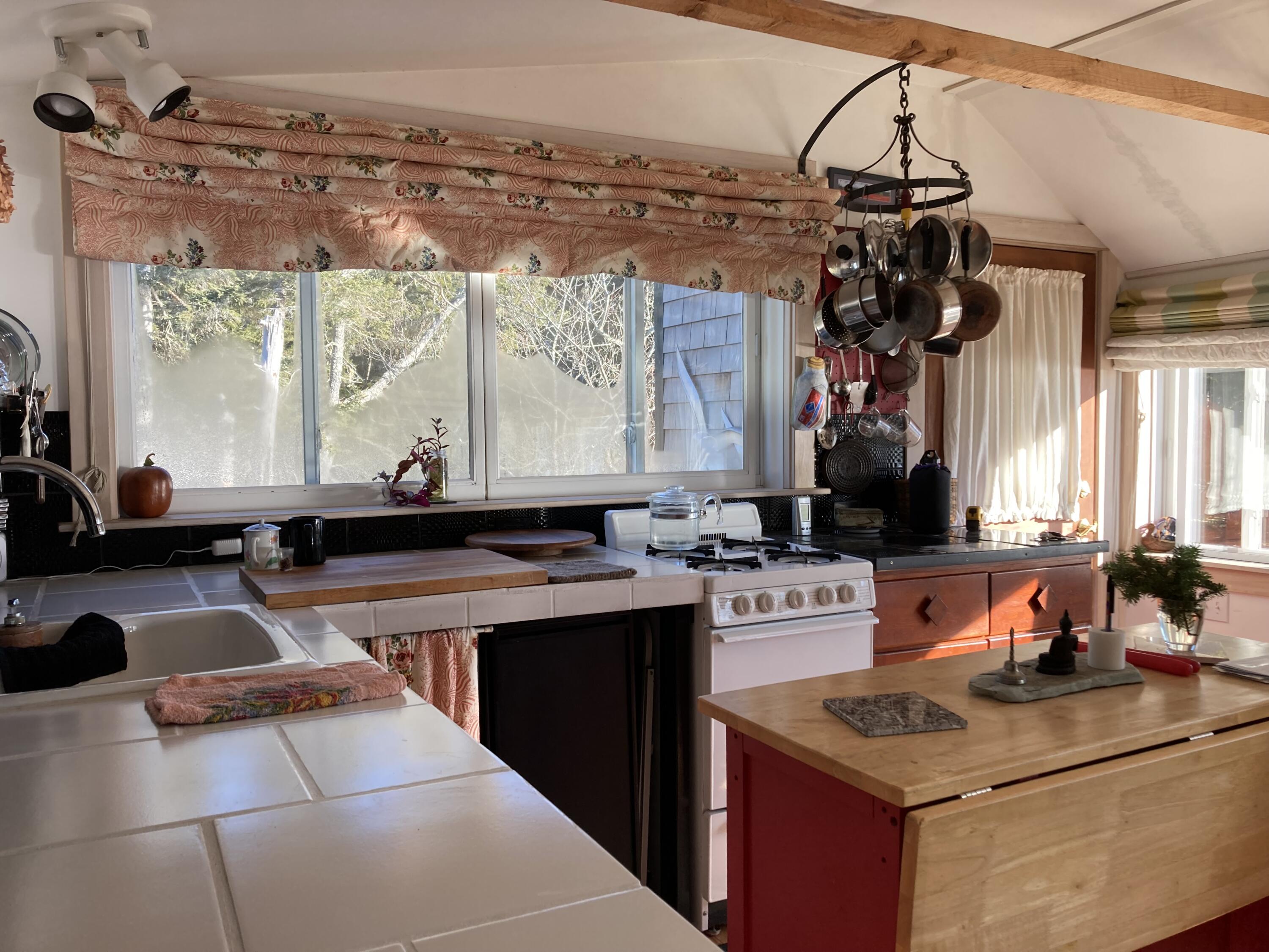 349 Oceanville Road Stonington, ME 04681 - Photo 8 of 16 Eat-in kitchen with island.