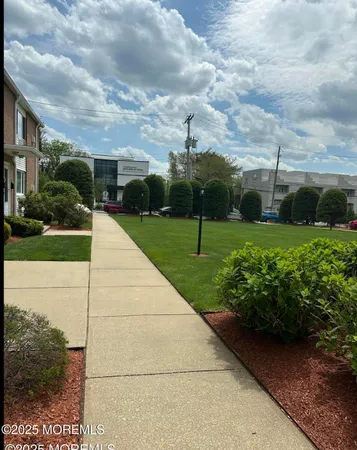 a view of a backyard with green space