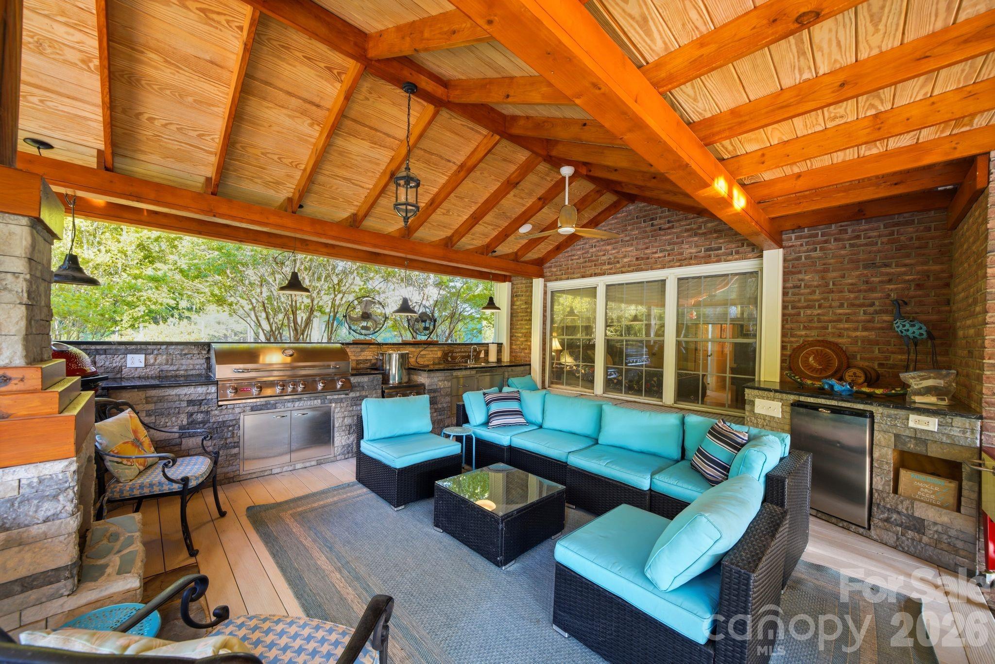 1171 State Rd S-29-376 Lancaster, SC 29720 - Photo 6 of 48 a outdoor living space with furniture and garden view