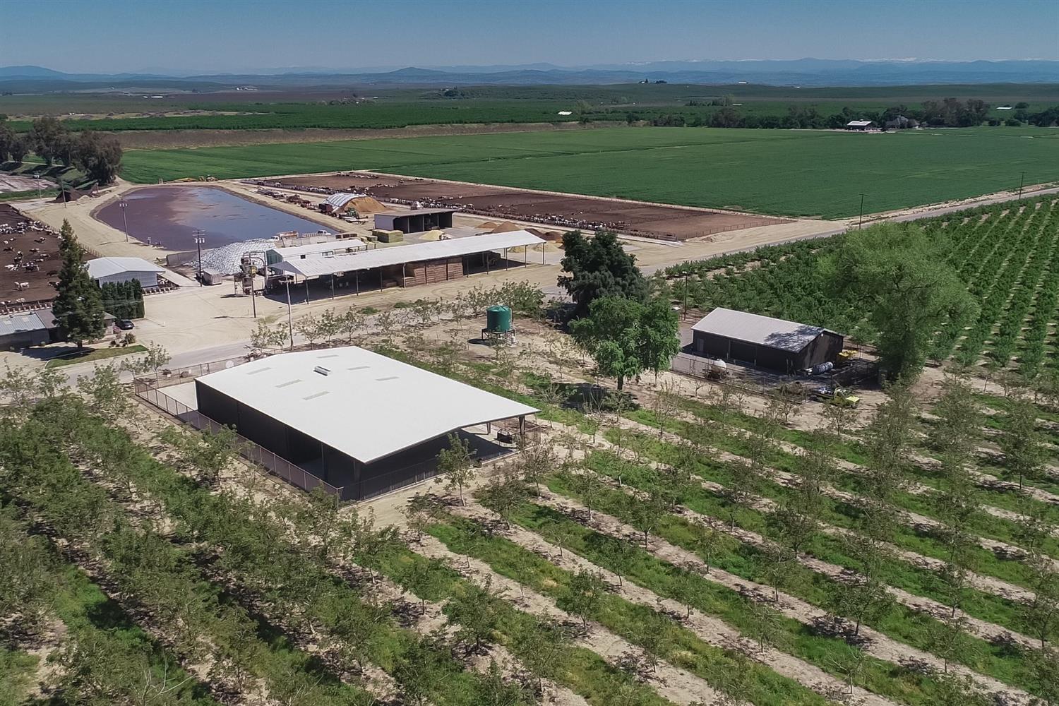 14954 Tim Bell Road Waterford, CA 95386 - Photo 12 of 28 an aerial view of a house with garden space and ocean view