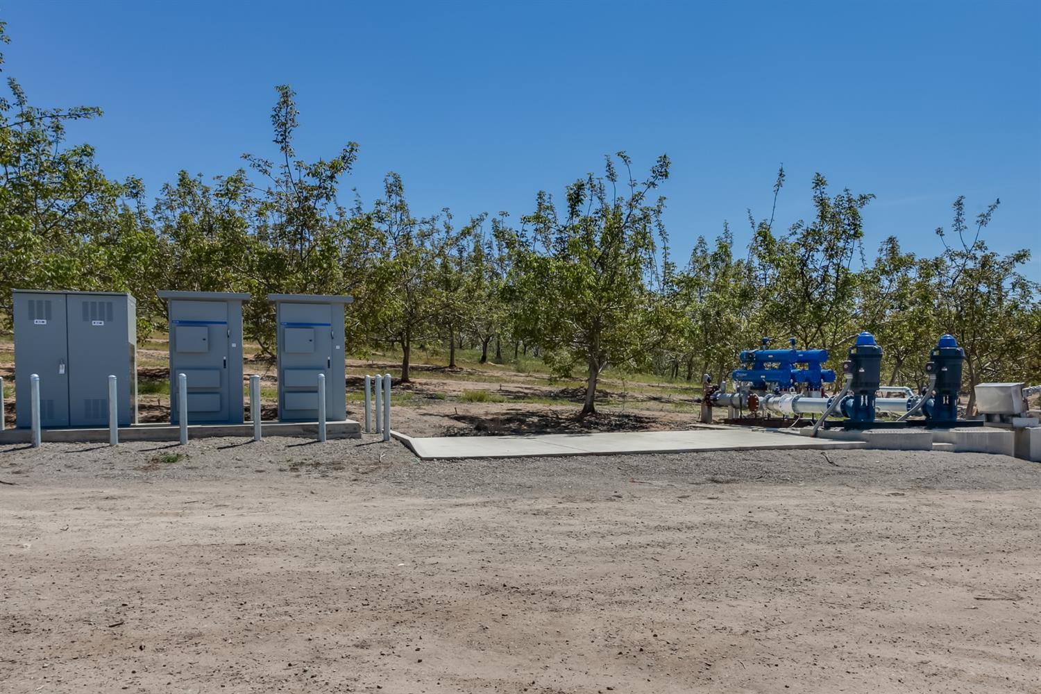 14954 Tim Bell Road Waterford, CA 95386 - Photo 20 of 28 a view of a house with trees in the background