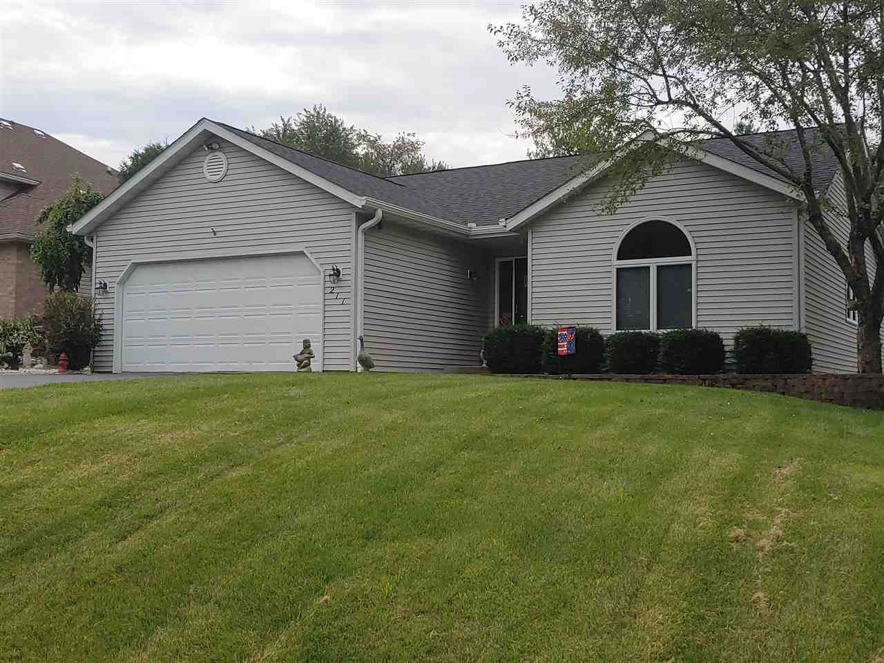 211 Rochester Road Northeast Poplar Grove, IL 61065 - Photo 11 of 17 a front view of house with yard and green space