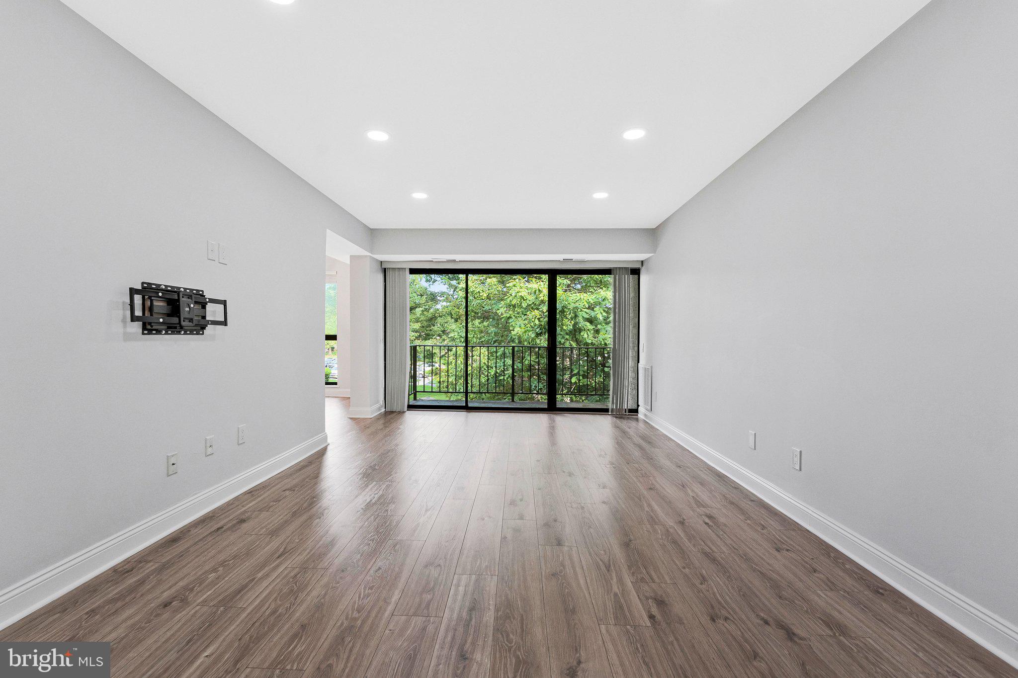 2012 Colts Neck Road, Unit 21A Reston, VA 20191 - Photo 3 of 44 Bright, airy space with nature views.