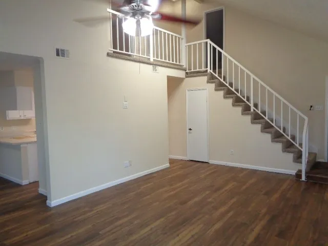 a view of entryway with wooden floor