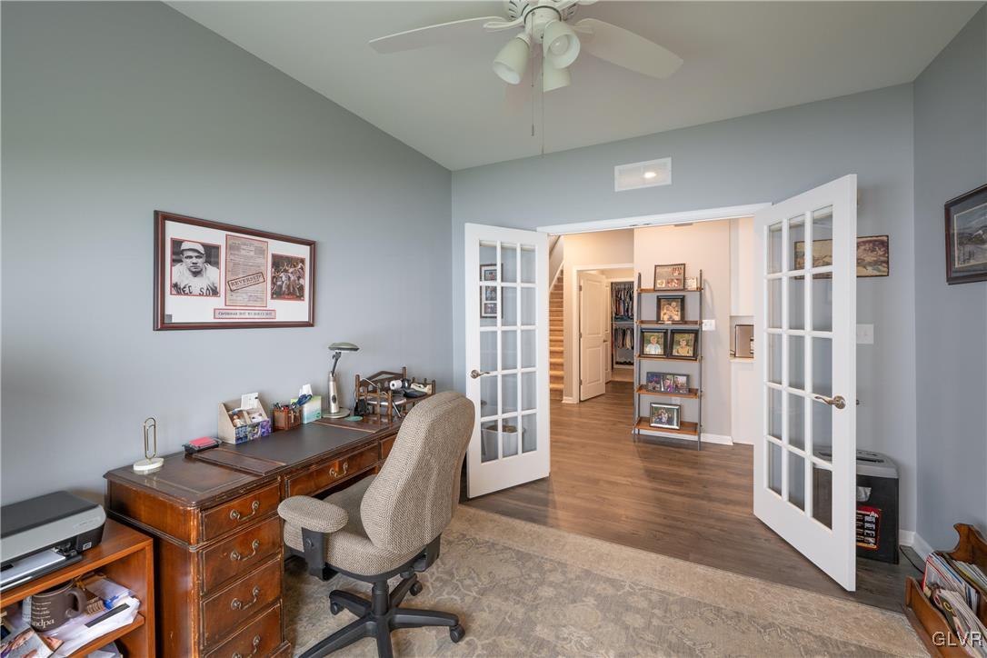 8078 Schaefer Crest Breinigsville, PA 18031 - Photo 17 of 35 a work room with furniture and book shelfs