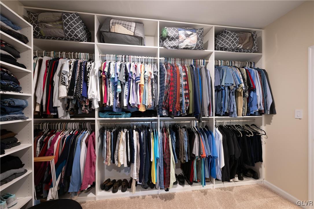 8078 Schaefer Crest Breinigsville, PA 18031 - Photo 25 of 35 a view of walk in closet with clothes