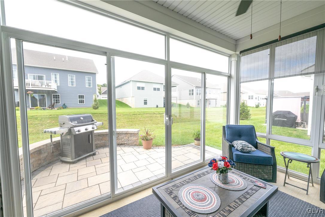 8078 Schaefer Crest Breinigsville, PA 18031 - Photo 31 of 35 a view of a dining room with furniture window and outside view