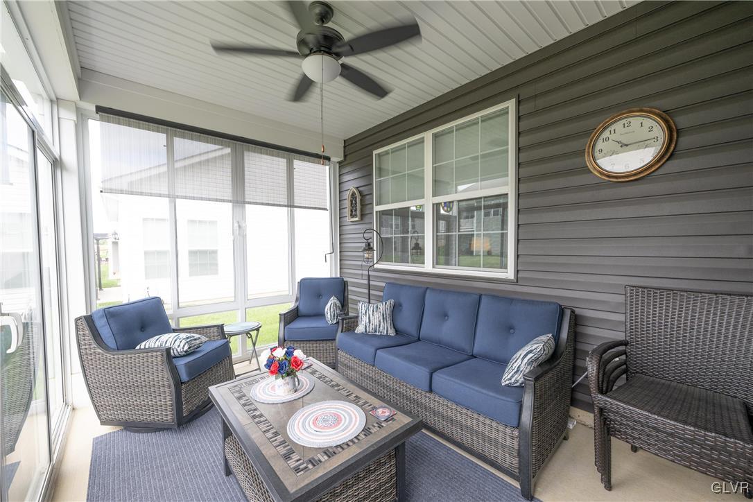 8078 Schaefer Crest Breinigsville, PA 18031 - Photo 32 of 35 a living room with furniture and a large window