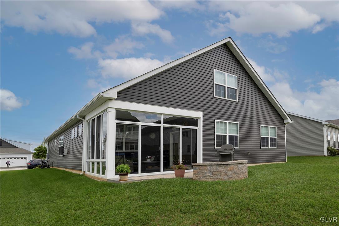 8078 Schaefer Crest Breinigsville, PA 18031 - Photo 33 of 35 a view of a house with a yard