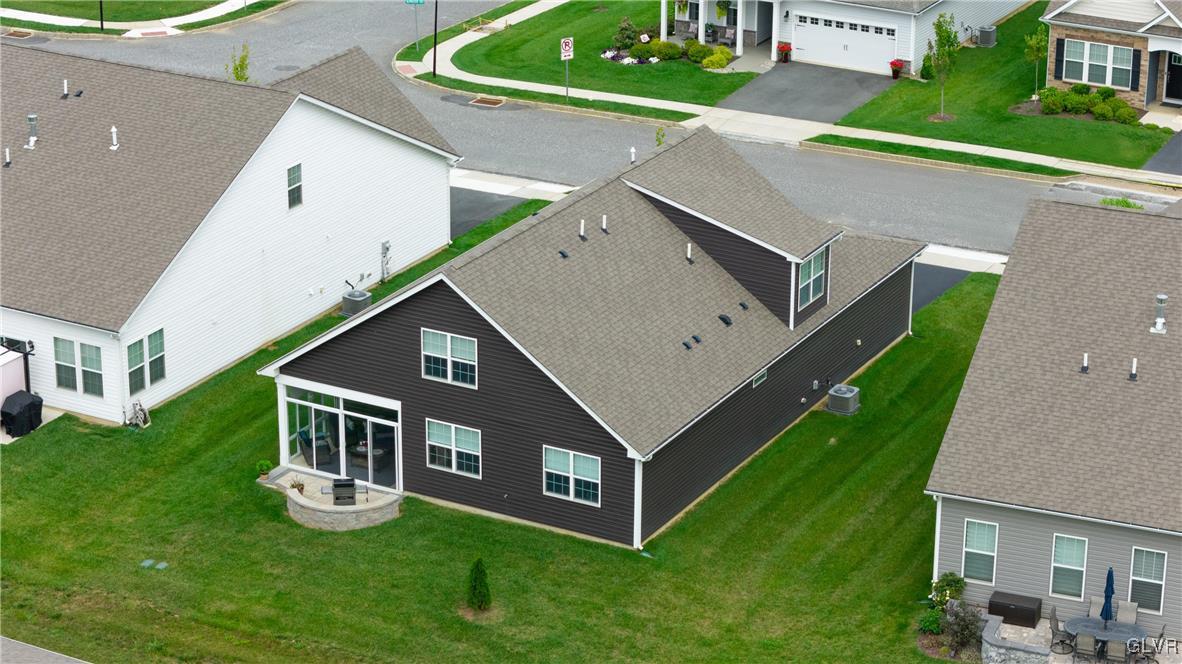8078 Schaefer Crest Breinigsville, PA 18031 - Photo 35 of 35 a aerial view of a house with a yard and sitting area
