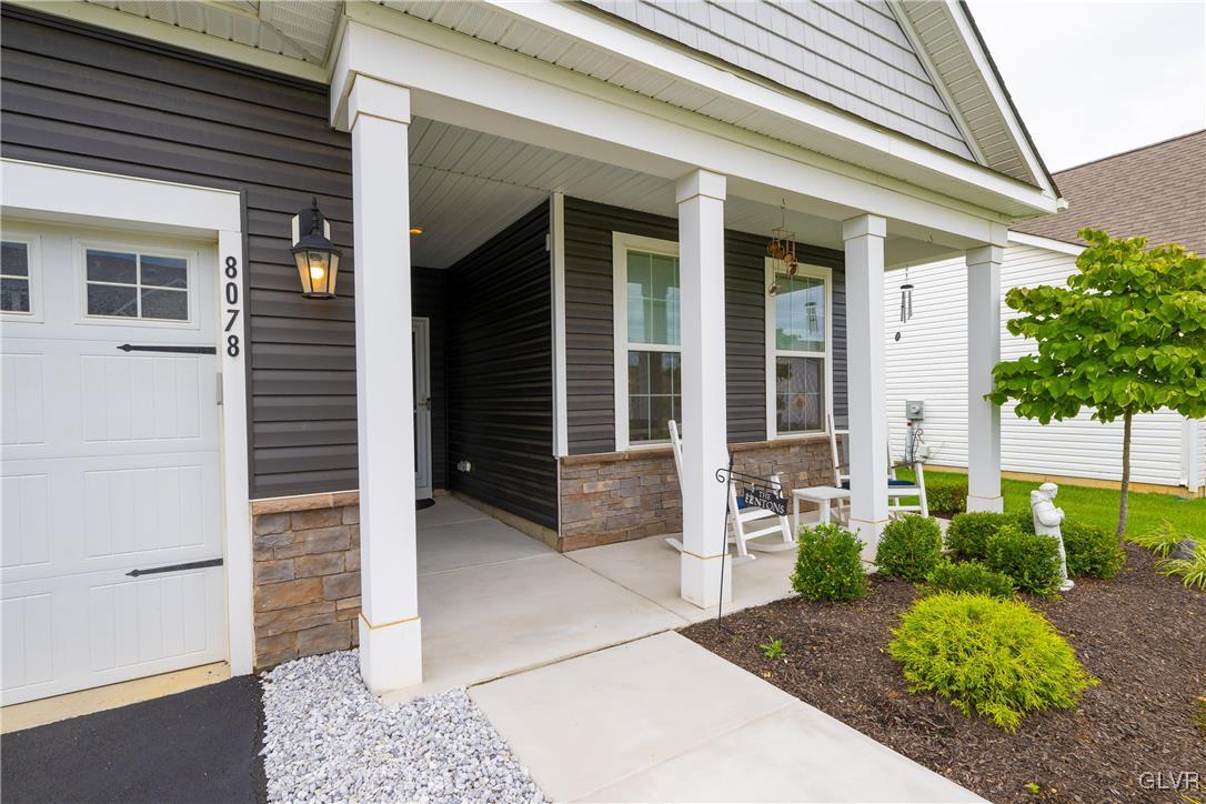 8078 Schaefer Crest Breinigsville, PA 18031 - Photo 4 of 35 a view of a entryway door front of house