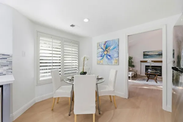 a view of a livingroom with furniture and a window