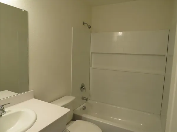 a bathroom with a sink and a bathtub