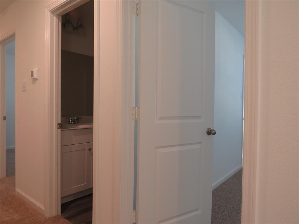 1906 Chapel Hill Road Princeton, TX 75407 - Photo 20 of 36 a bathroom with a closet