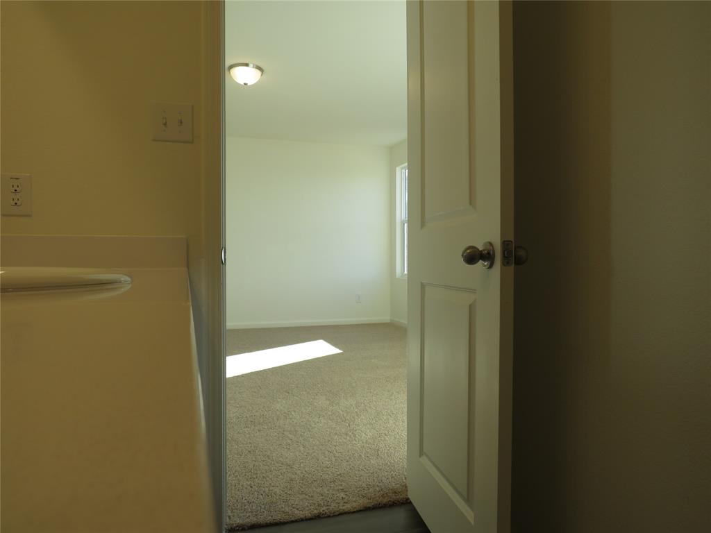 1906 Chapel Hill Road Princeton, TX 75407 - Photo 27 of 36 a bathroom with a shower