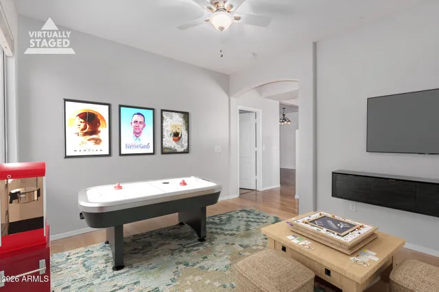 a living room with furniture and a table