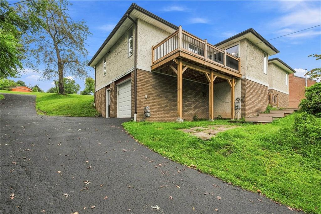 7440 Noblestown Road McDonald, PA 15057 - Photo 29 of 32 NEW DRIVEWAY/ INTEGRAL GARAGE