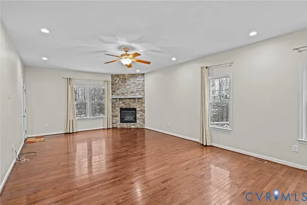 a large kitchen with stainless steel appliances lots of counter top space
