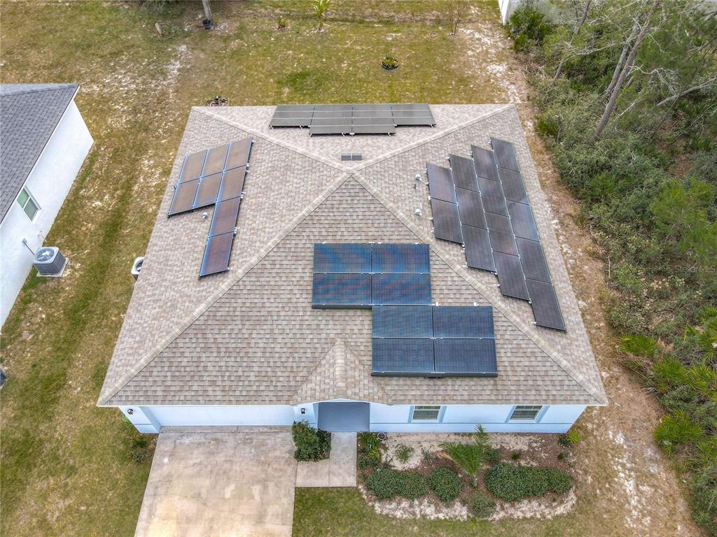 208 Goldenrod Lane Kissimmee, FL 34759 - Photo 40 of 40 front view of a house with a yard