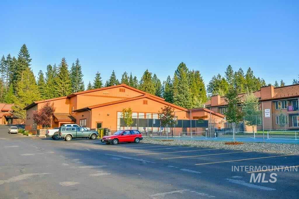 1607 Davis Avenue, Unit C6 McCall, ID 83638 - Photo 21 of 30 Uncovered parking lot with a residential view
