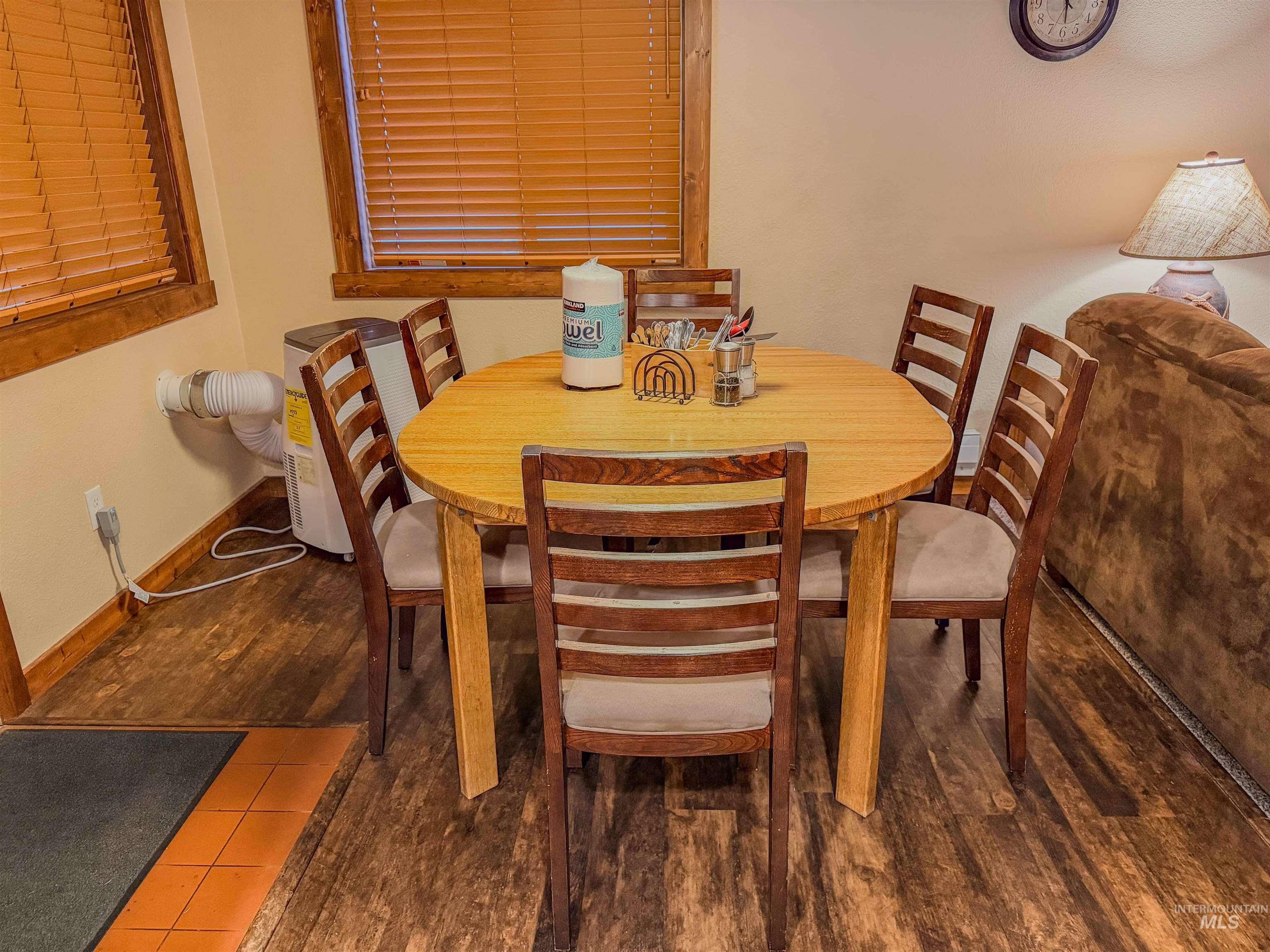 1607 Davis Avenue, Unit C6 McCall, ID 83638 - Photo 7 of 30 Dining room with wood finished floors and baseboards