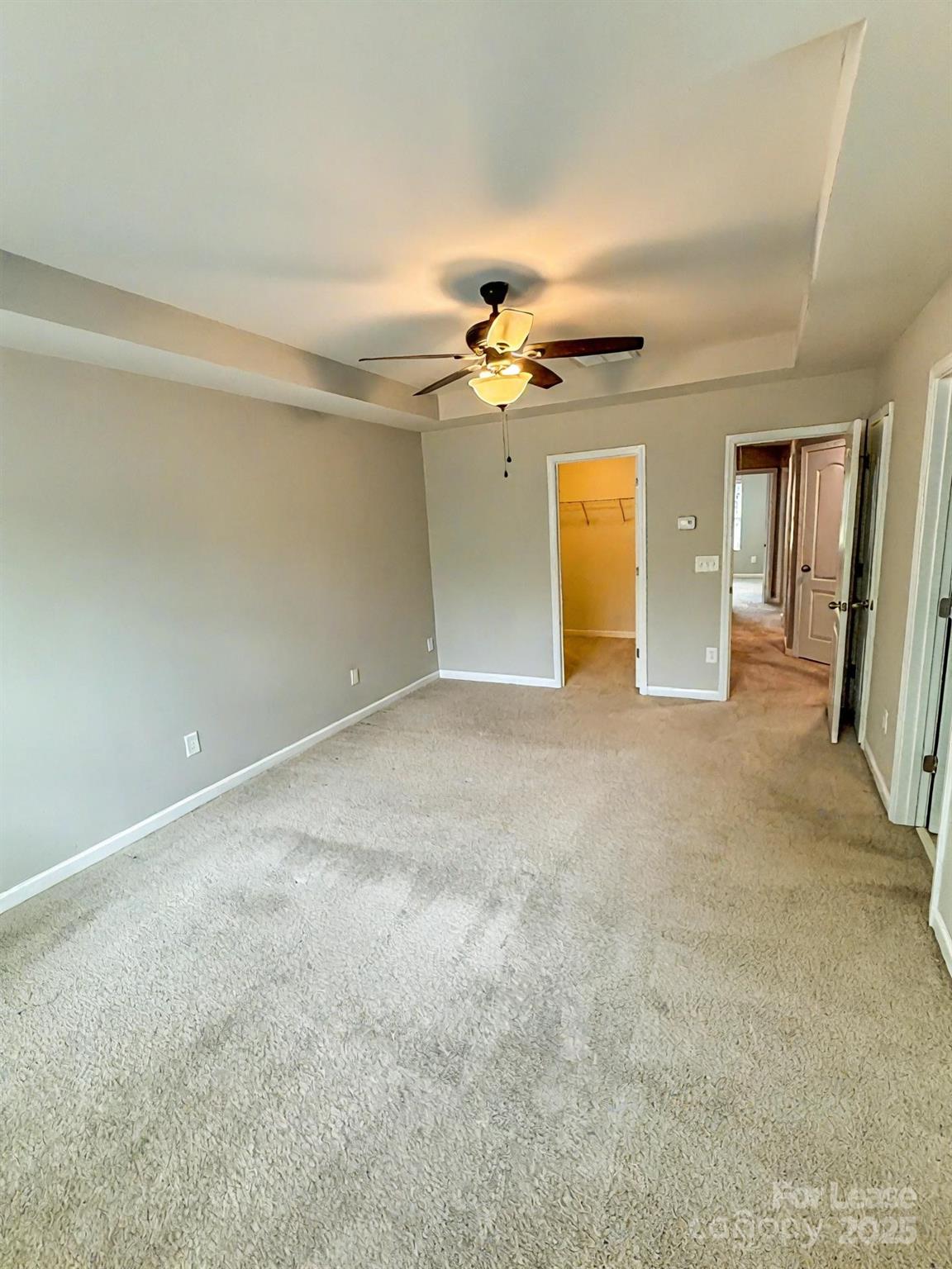 2752 Sawbridge Lane Gastonia, NC 28056 - Photo 12 of 25 an empty room with a ceiling fan and a window