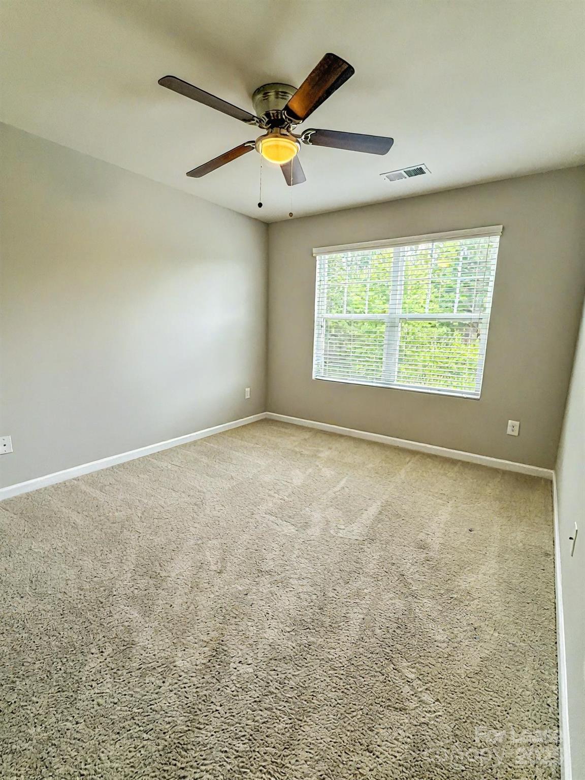 2752 Sawbridge Lane Gastonia, NC 28056 - Photo 22 of 25 an empty room with a window