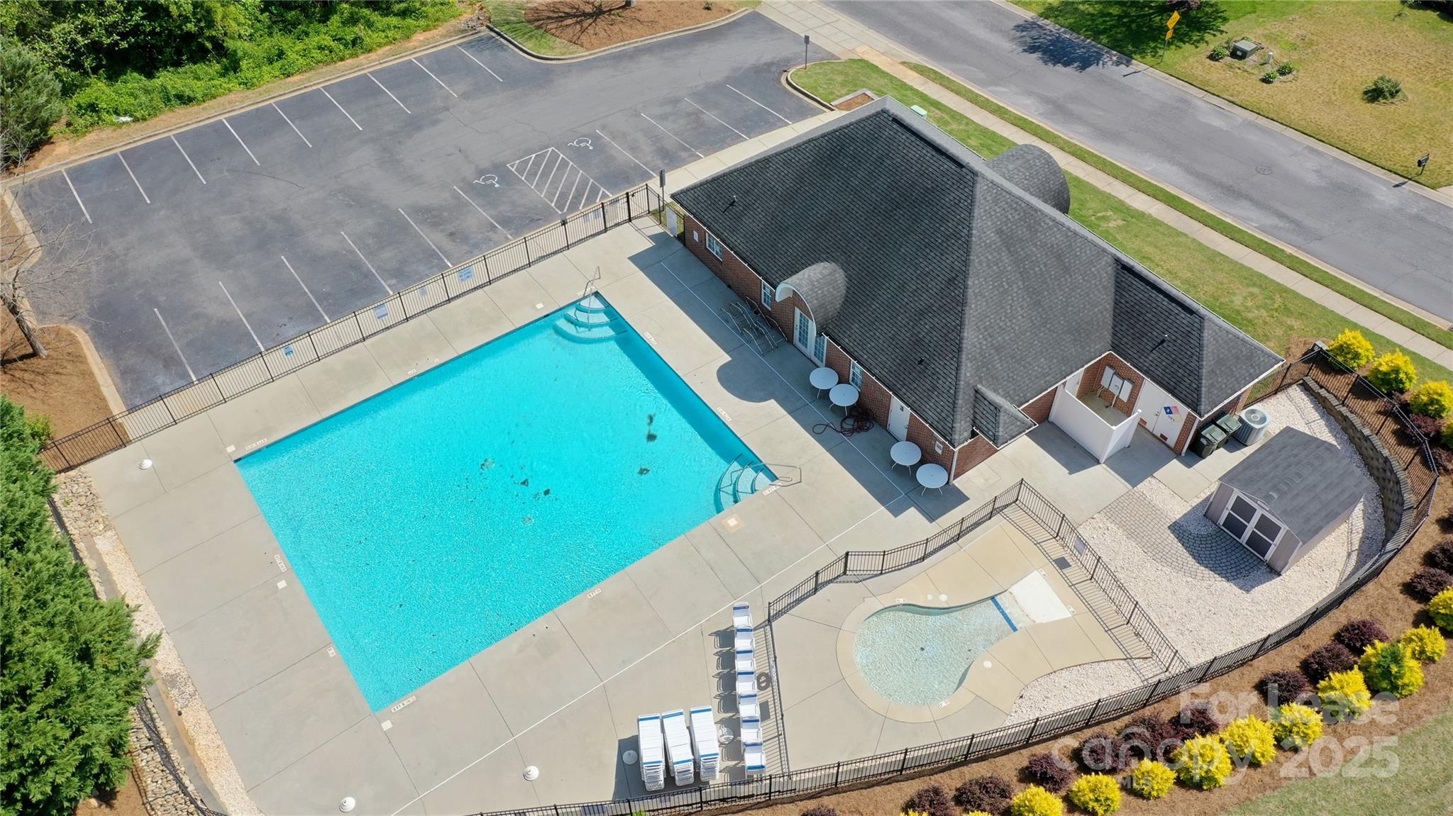 2752 Sawbridge Lane Gastonia, NC 28056 - Photo 25 of 25 an aerial view of a house with a swimming pool