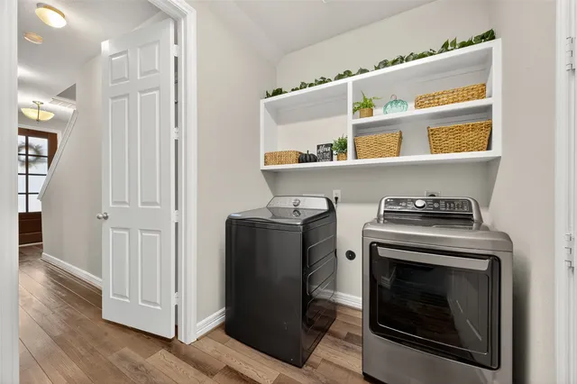 a kitchen with stove and cabinets