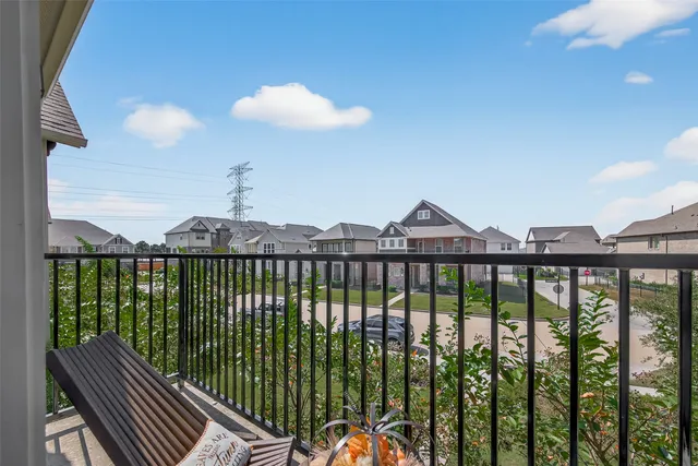 a view of a balcony with an outdoor space