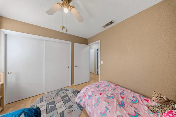 a bathroom with a sink double vanity and a shower