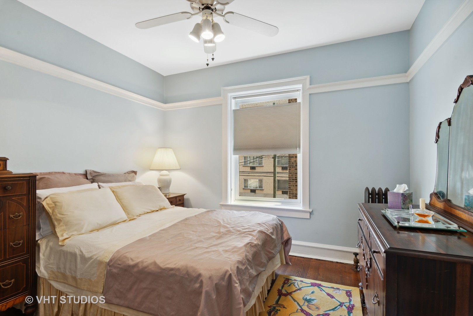 3755 North Pine Grove Avenue, Unit 2 Chicago, IL 60613 - Photo 11 of 17 a bedroom with a bed and a window