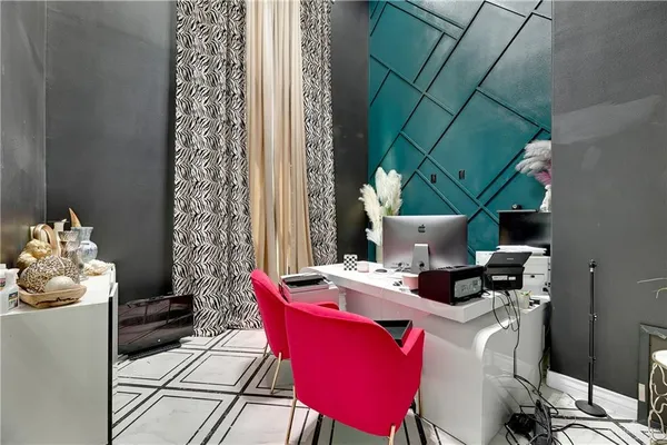 a dining room with furniture window and outside view