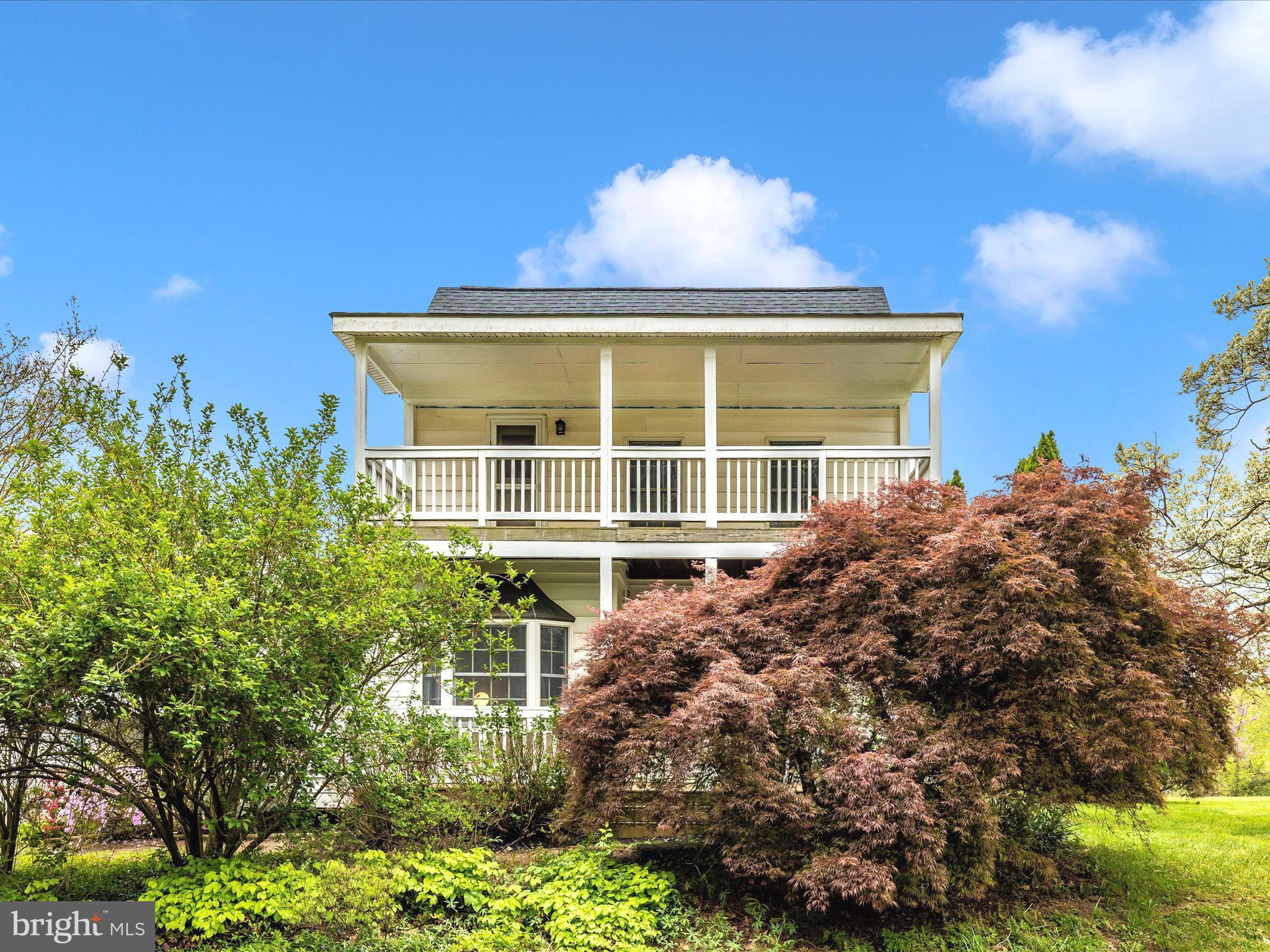 15920 Barnesville Road Boyds, MD 20841 - Photo 50 of 57 a front view of a house with a yard