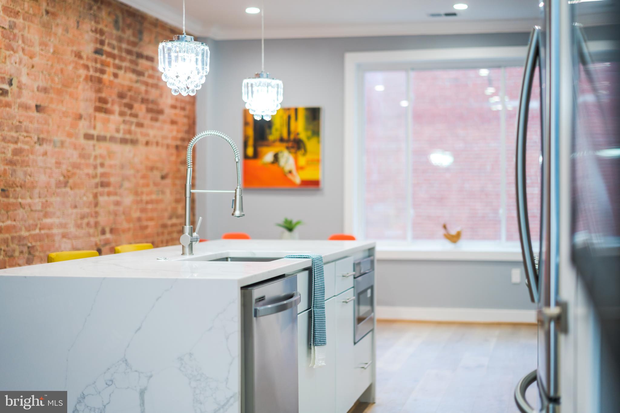 435 Park Road Northwest, Unit 2 Washington, DC 20010 - Photo 8 of 39 Gorgeous Quartz Waterfall Kitchen Island