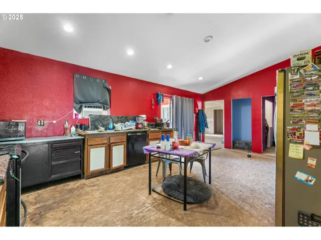 a room with furniture and wooden floor