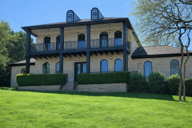 1004 Elder Circle Austin, TX 78733 - Photo 1 of 1 a front view of a house with a garden
