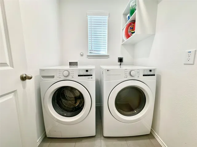 a view of a porch with furniture and garden