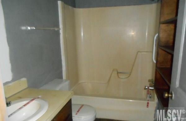 921 Engineer Road Bostic, NC 28018 - Photo 2 of 13 a bathroom with a sink and a toilet
